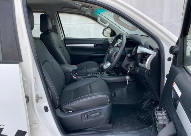 Подержанный Toyota Hilux VIII, 2.8 л, 2019 в Дубае от Alhamd Motors Белый цвет. Other | AUTO.AE