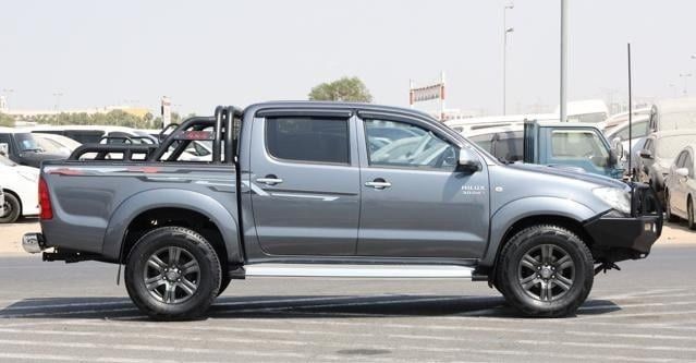 Подержанный Toyota Hilux VII, 3.0 л, 2009 в Дубае от Alhamd Motors Серый цвет. Other | AUTO.AE