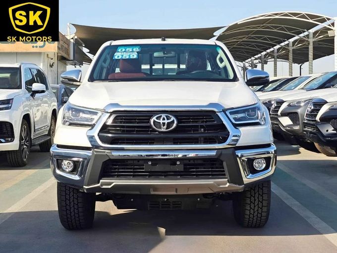 New Toyota Hilux VIII Facelift 2, 2.7 l, 2025 in Dubai by SK Motors, White color. GCC Specs | AUTO.AE