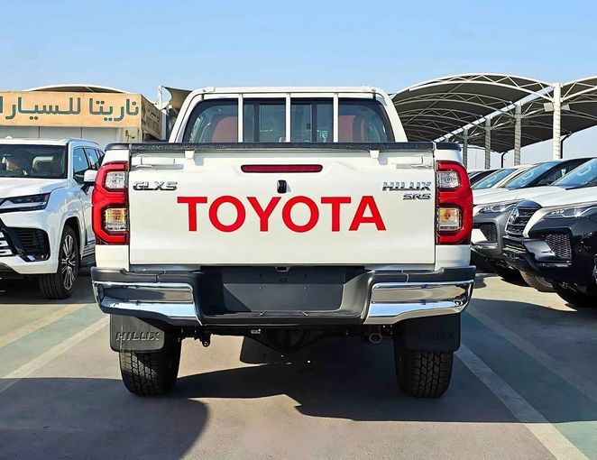New Toyota Hilux VIII Facelift 2, 2.7 l, 2025 in Dubai by SK Motors, White color. GCC Specs | AUTO.AE