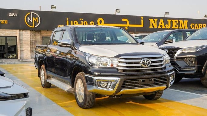 Новый Toyota Hilux VIII Рестайлинг, 4.0 л, 2025 в Дубае от Najem Motors Черный цвет. GCC | AUTO.AE