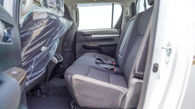 Новый Toyota Hilux VIII Рестайлинг, 2.7 л, 2025 в Дубае от Najem Motors Белый цвет. GCC | AUTO.AE