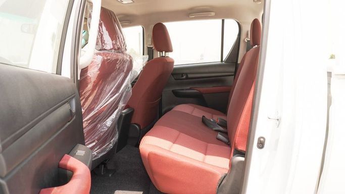 Новый Toyota Hilux VIII Рестайлинг, 2.4 л, 2025 в Дубае от Najem Motors Белый цвет. GCC | AUTO.AE
