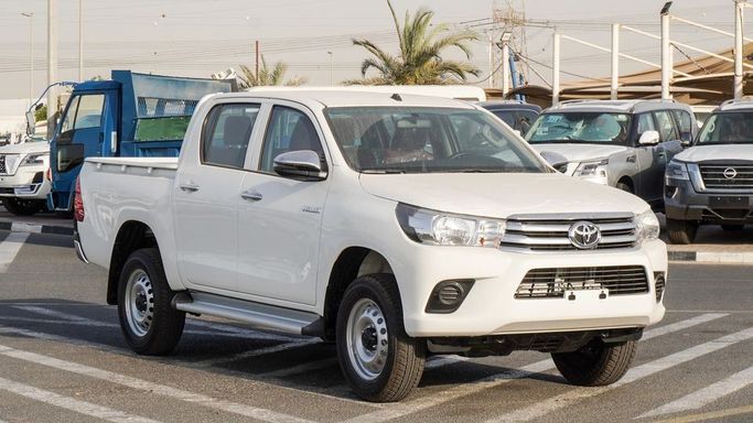 New Toyota Hilux VIII Facelift, 2.7 l, 2025 in Dubai by Najem Motors, White color. GCC Specs | AUTO.AE