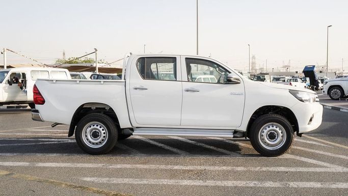 New Toyota Hilux VIII Facelift, 2.7 l, 2025 in Dubai by Najem Motors, White color. GCC Specs | AUTO.AE