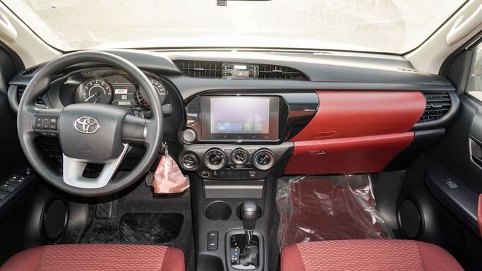 New Toyota Hilux VIII Facelift, 2.7 l, 2025 in Dubai by Najem Motors, White color. GCC Specs | AUTO.AE