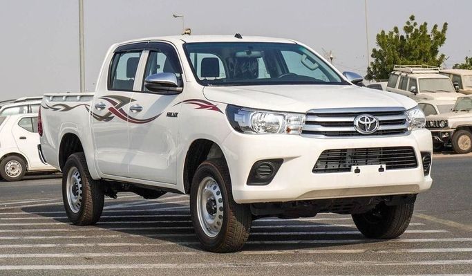 New Toyota Hilux VIII Facelift, 2.4 l, 2025 in Dubai by Najem Motors, White color. GCC Specs | AUTO.AE