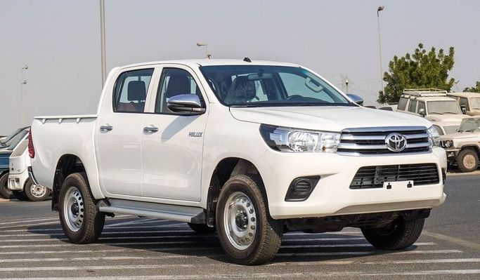 New Toyota Hilux VIII Facelift, 2.7 l, 2025 in Dubai by Najem Motors, White color. GCC Specs | AUTO.AE