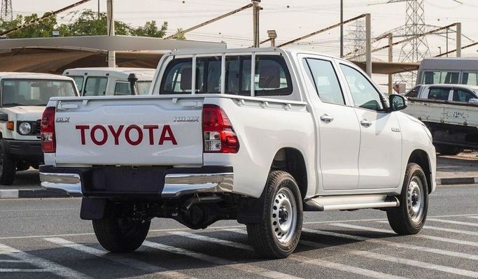 New Toyota Hilux VIII Facelift, 2.7 l, 2025 in Dubai by Najem Motors, White color. GCC Specs | AUTO.AE