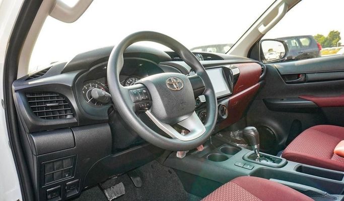 New Toyota Hilux VIII Facelift, 2.7 l, 2025 in Dubai by Najem Motors, White color. GCC Specs | AUTO.AE