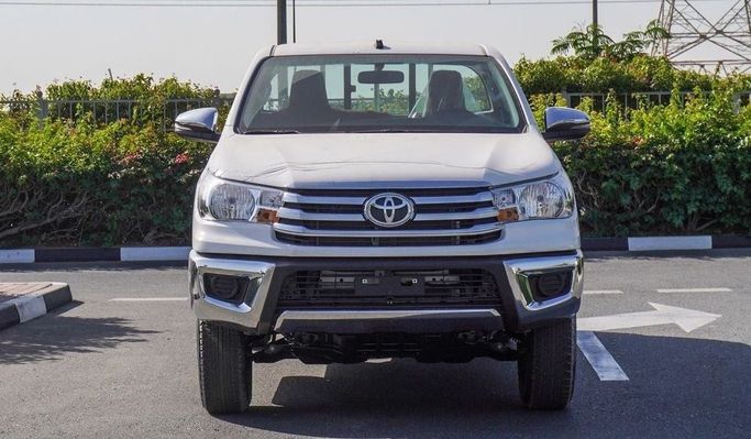 Новый Toyota Hilux Extra Cab VIII Рестайлинг, 2.4 л, 2025 в Дубае от Najem Motors Белый цвет. GCC | AUTO.AE