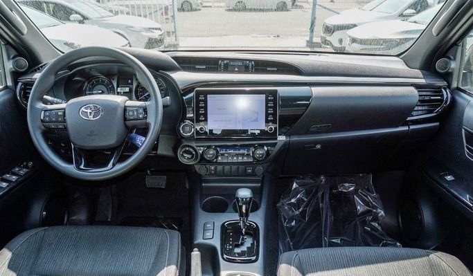New Toyota Hilux VIII Facelift, 4.0 l, 2025 in Dubai by Najem Motors, Black color. GCC Specs | AUTO.AE