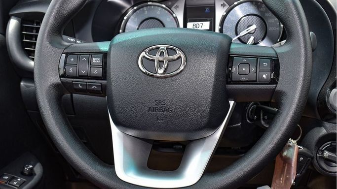 New Toyota Hilux VIII Facelift, 2.4 l, 2024 in Dubai by Najem Motors, White color. GCC Specs | AUTO.AE