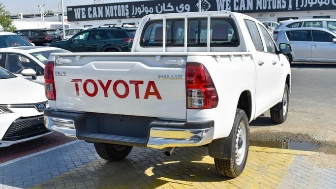 New Toyota Hilux VIII Facelift, 2.4 l, 2024 in Dubai by Najem Motors, White color. GCC Specs | AUTO.AE