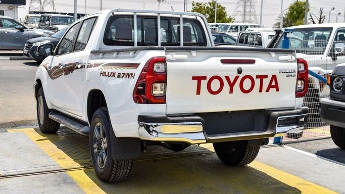 New Toyota Hilux VIII Facelift, 4.0 l, 2024 in Dubai by Najem Motors, White color. GCC Specs | AUTO.AE