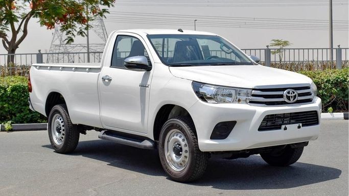 New Toyota Hilux Extra Cab VIII Facelift, 2.8 l, 2024 in Dubai by Najem Motors, White color. GCC Specs | AUTO.AE