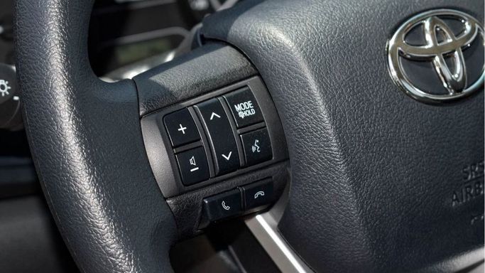 New Toyota Hilux Extra Cab VIII Facelift, 2.8 l, 2024 in Dubai by Najem Motors, White color. GCC Specs | AUTO.AE