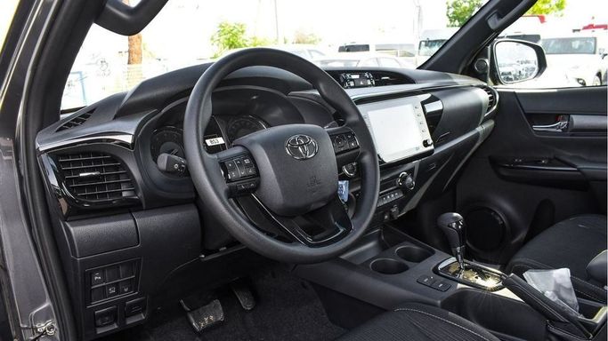 New Toyota Hilux VIII Facelift, 4.0 l, 2024 in Dubai by Najem Motors, Grey color. GCC Specs | AUTO.AE