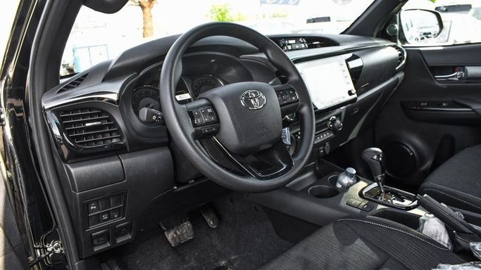 New Toyota Hilux VIII Facelift, 4.0 l, 2024 in Dubai by Najem Motors, Black color. GCC Specs | AUTO.AE
