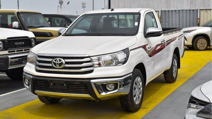 New Toyota Hilux Extra Cab VIII Facelift, 2.8 l, 2024 in Dubai by Najem Motors, White color. GCC Specs | AUTO.AE