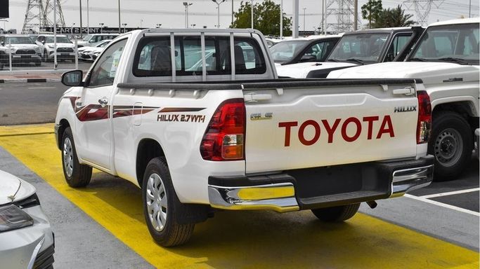 New Toyota Hilux Extra Cab VIII Facelift, 2.8 l, 2024 in Dubai by Najem Motors, White color. GCC Specs | AUTO.AE