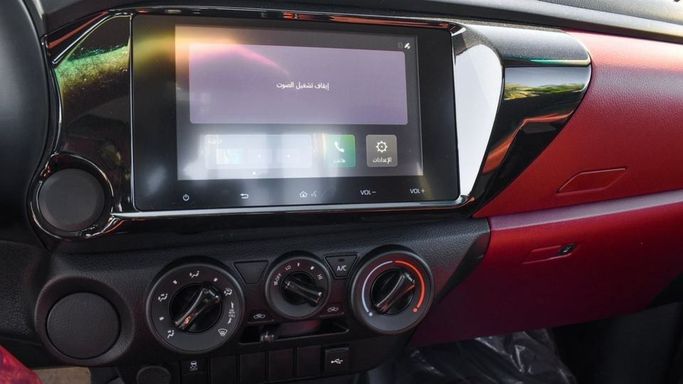New Toyota Hilux Extra Cab VIII Facelift, 2.4 l, 2024 in Dubai by Najem Motors, White color. GCC Specs | AUTO.AE