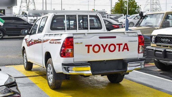 New Toyota Hilux VIII Facelift, 2.7 l, 2024 in Dubai by Najem Motors, White color. GCC Specs | AUTO.AE