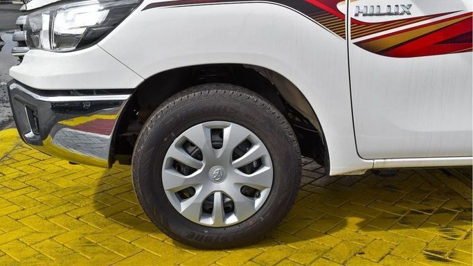 New Toyota Hilux VIII Facelift, 2.7 l, 2024 in Dubai by Najem Motors, White color. GCC Specs | AUTO.AE