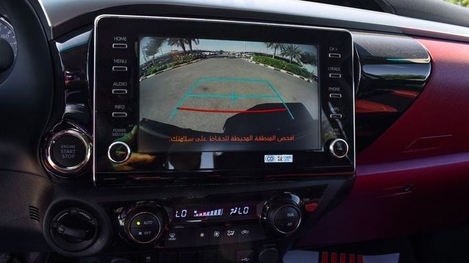 New Toyota Hilux VIII Facelift 2, 2.7 l, 2024 in Dubai by Najem Motors, White color. GCC Specs | AUTO.AE