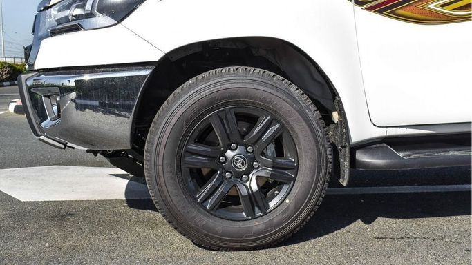 New Toyota Hilux VIII Facelift 2, 2.7 l, 2024 in Dubai by Najem Motors, White color. GCC Specs | AUTO.AE