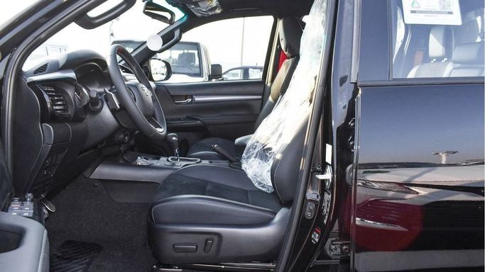 New Toyota Hilux VIII Facelift, 4.0 l, 2024 in Dubai by Najem Motors, Black color. GCC Specs | AUTO.AE