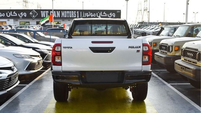 New Toyota Hilux VIII Facelift 2, 2.7 l, 2024 in Dubai by Najem Motors, White color. GCC Specs | AUTO.AE