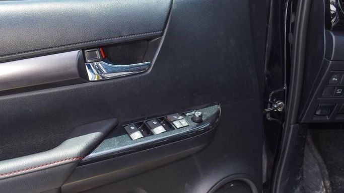 New Toyota Hilux VIII Facelift, 2.8 l, 2023 in Dubai by Najem Motors, Black color. GCC Specs | AUTO.AE