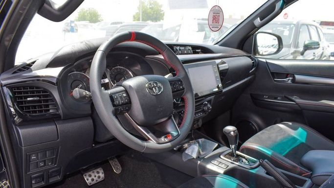 New Toyota Hilux VIII Facelift, 2.8 l, 2023 in Dubai by Najem Motors, Black color. GCC Specs | AUTO.AE