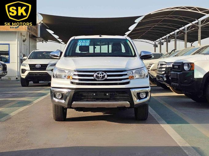 Новый Toyota Hilux VIII Рестайлинг 2, 2.7 л, 2025 в Дубае от SK Motors Белый цвет. GCC | AUTO.AE
