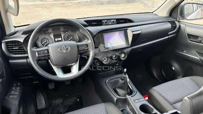Новый Toyota Hilux VIII Рестайлинг 2, 2.8 л, 2024 в Дубае от Falcons GT Motors FZCO Белый цвет. Европейская | AUTO.AE