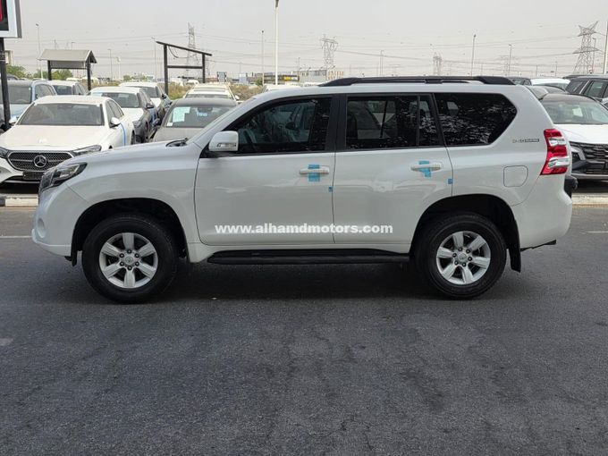 Подержанный Toyota Land Cruiser Prado 150 Series Рестайлинг 1, 2.8 л, 2016 в Дубае от Alhamd Motors Белый цвет. Other | AUTO.AE