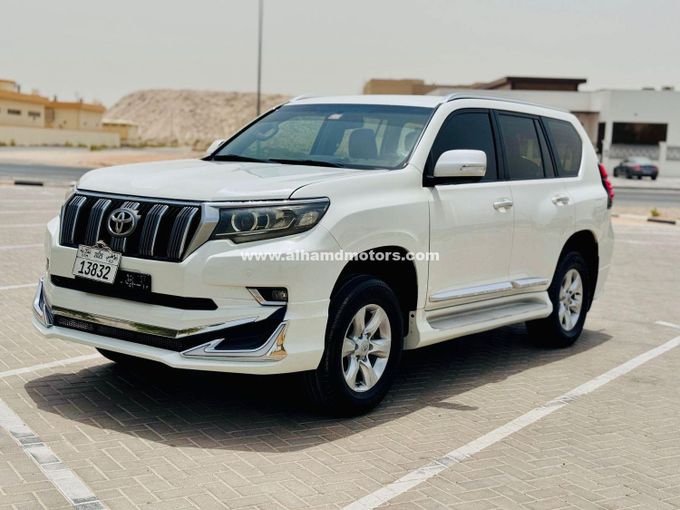 Подержанный Toyota Land Cruiser Prado 150 Series Рестайлинг 1, 2.7 л, 2013 в Дубае от Alhamd Motors Белый цвет. GCC | AUTO.AE