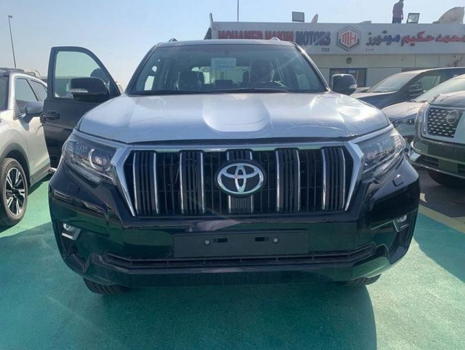 New Toyota Land Cruiser Prado 150 Series Facelift 3, 4.0 l, 2023 in Dubai by Mohamed Hakim Motors, White color. GCC Specs | AUTO.AE