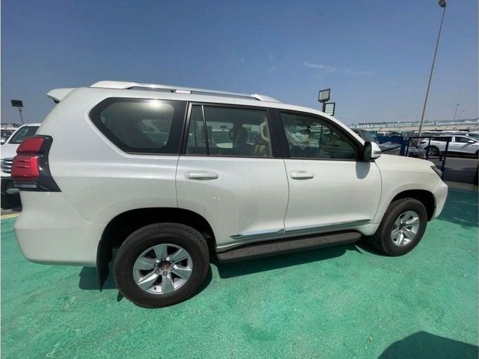 New Toyota Land Cruiser Prado 150 Series Facelift 3, 4.0 l, 2023 in Dubai by Mohamed Hakim Motors, White color. GCC Specs | AUTO.AE