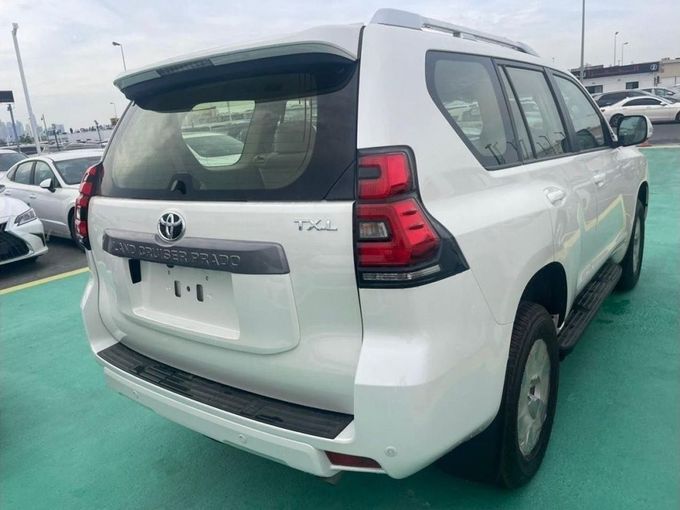 New Toyota Land Cruiser Prado 150 Series Facelift 3, 2.7 l, 2023 in Dubai by Mohamed Hakim Motors, White color. GCC Specs | AUTO.AE