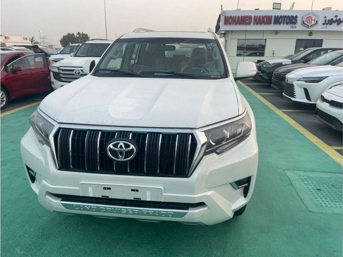 New Toyota Land Cruiser Prado 150 Series Facelift 3, 2.7 l, 2023 in Dubai by Mohamed Hakim Motors, White color. GCC Specs | AUTO.AE