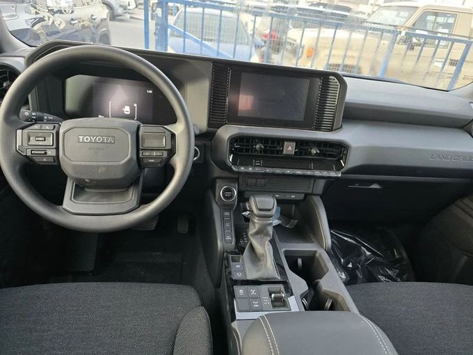 New Toyota Land Cruiser Prado 250 Series, 2.4 l, 2025 in Dubai by Mohamed Hakim Motors, White color. GCC Specs | AUTO.AE