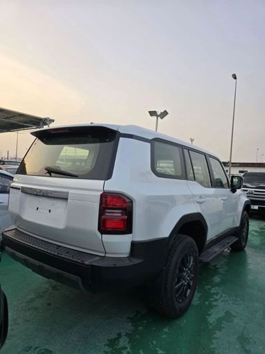 New Toyota Land Cruiser Prado 250 Series, 2.4 l, 2025 in Dubai by Mohamed Hakim Motors, White color. GCC Specs | AUTO.AE