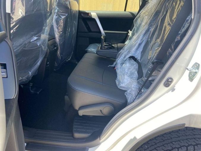 New Toyota Land Cruiser Prado 150 Series Facelift 3, 4.0 l, 2023 in Dubai by Mohamed Hakim Motors, White color. GCC Specs | AUTO.AE