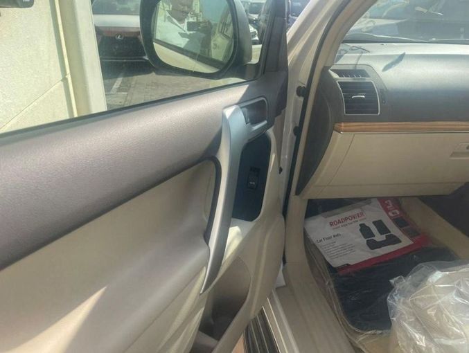 New Toyota Land Cruiser Prado 150 Series Facelift 3, 2.8 l, 2023 in Dubai by Mohamed Hakim Motors, White color. GCC Specs | AUTO.AE