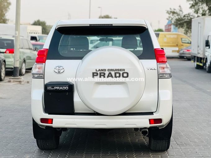 Подержанный Toyota Land Cruiser Prado 150 Series, 2.7 л, 2012 в Дубае от Alhamd Motors Белый цвет. GCC | AUTO.AE