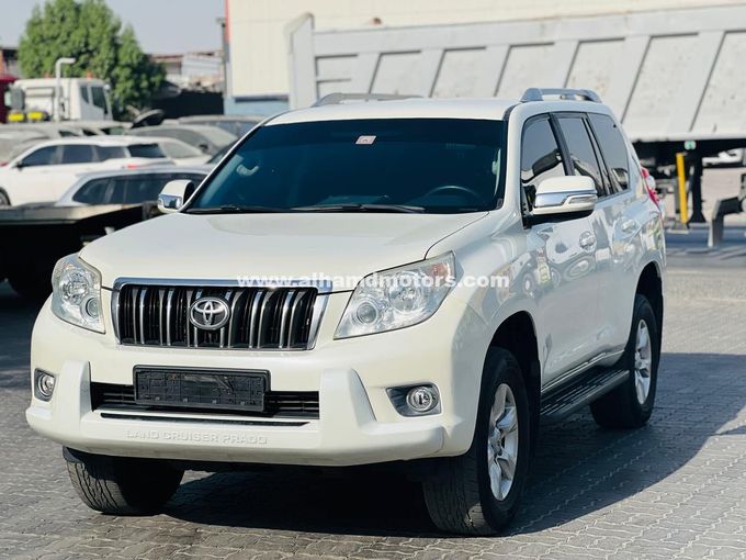 Подержанный Toyota Land Cruiser Prado 150 Series Рестайлинг 1, 2.7 л, 2013 в Дубае от Alhamd Motors Белый цвет. GCC | AUTO.AE