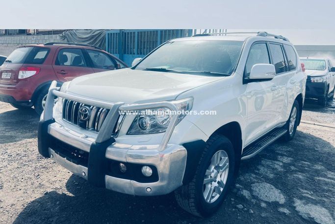 Подержанный Toyota Land Cruiser Prado 150 Series Рестайлинг 1, 3.0 л, 2013 в Дубае от Alhamd Motors Белый цвет. Other | AUTO.AE