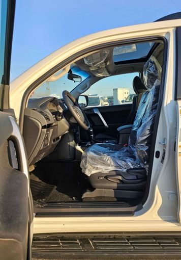 New Toyota Land Cruiser Prado 150 Series Facelift 3, 4.0 l, 2023 in Dubai by SK Motors, White color. GCC Specs | AUTO.AE